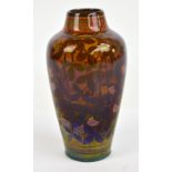 A Pilkington's Royal Lancastrian lustre ovoid vase decorated by Gladys Rogers with grapes and vines