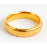 A 22ct yellow gold D-shaped wedding band, size K 1/2, approx 6.5g.