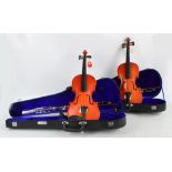 Two Chinese Skylark three quarter size violin outfits.