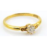 An 18ct yellow gold and diamond ring, with an old cut single stone, size P1/2, approx. 2.4g.