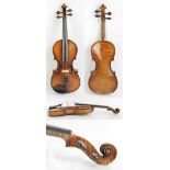 A full size German violin, unlabelled, the two-piece back 35.6cm.