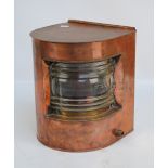 A vintage copper ships port lantern with red quarter lights, sliding back, converted to electricity,