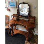 A Victorian mahogany Duchess dressing table with shaped undertier and fluted uprights, width 126cm.