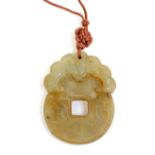 A 20th century Chinese jade good luck pendant,