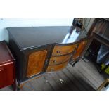 A reproduction mahogany bowfronted sideboard.