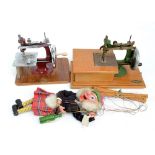 A Pelham puppet 'McBoozle' (unboxed), and two child's sewing machines (3).