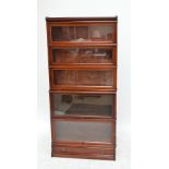 GLOBE WERNICKE; a mahogany five tiered glazed stacking bookcase with drawer to base.