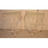 A pair of white-painted wrought iron demi-lune glass top tables (2).