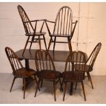 An Ercol 'Old Colonial' elm rectangular dining table,