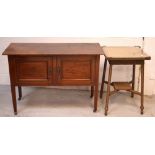 An Edwardian mahogany washstand with two panelled doors and a Lloyd Loom style gold-painted hall
