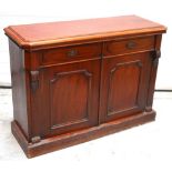 A Victorian mahogany buffet sideboard with canted top edge,