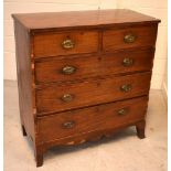A Victorian mahogany two-over-three chest of drawers on curved plinth base to spade feet,