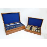 An oak cased canteen of silver plated cutlery and flatware with beaded decoration,