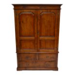 ANDREW KIDD; a reproduction oak livery cupboard/wardrobe,