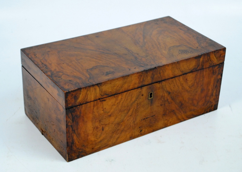 A mid-19th century walnut box with hinged lid and sectioned interior, width 37cm.