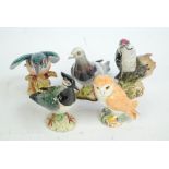 Five Beswick figures of birds; 'Lesser Spotted Woodpecker' no.242, 'Lapwing' model no.
