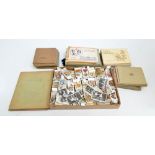 A very large quantity of cigarette cards, both in albums and loose.