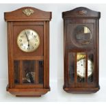 Two early 20th century oak cased wall clocks including a thirty hour example,