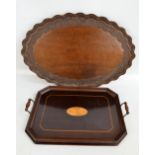 An Edwardian mahogany starburst motif inlaid twin handled rectangular tray with canted corners,