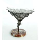 An electroplated centrepiece of tapering form with pierced and cast floral and foliate decoration