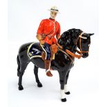 A Beswick figure 'Canadian Mountie', model No.1375, height 21cm.