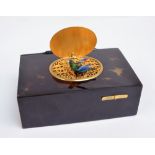 A probably Swiss late 19th century tortoiseshell cased singing bird box,