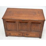 ANDREW KIDD; a reproduction oak blanket box with hinged lid,