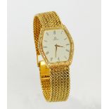 OMEGA; Reggie Kray's 18ct yellow gold diamond encrusted wristwatch,