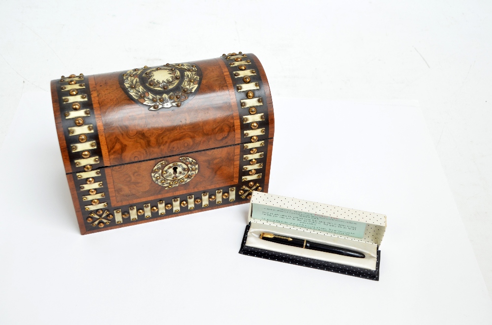 A Victorian walnut and strap bound and stud decorated dome top trinket box and a boxed Parker