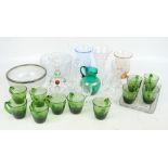 A quantity of mixed glassware including a green over-painted jug, a cut glass circular bowl,