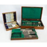 An oak cased part fitted canteen of cutlery and a small oak cased matched set of fish knives and