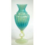 A large vaseline glass urn shaped vase with wavy flared rim and with fluted rope twist decorated