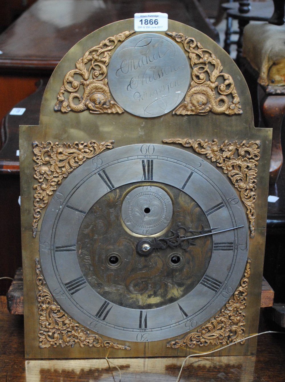 A brass longcase clock dial with eight day movement inscribed 'Michel Neilssen,