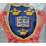 A WWII wool work panel with the Oxford University crest and motto 'Dominus Illuminatio Mia' with