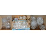 A quantity of cut crystal tableware to include a lidded punch bowl and ladle, seven vases,