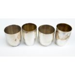 Two pairs of post 1888 German silver tot cups, one by M.H.