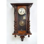 An early 20th century Vienna eight day spring driven wall clock,