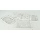 A small quantity of clear cut and pressed glass to include eight wheel engraved wine glasses of