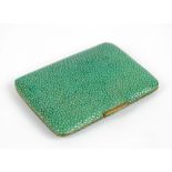 An early 20th century gilt metal and shagreen covered cigarette case, 9 x 6.5cm.