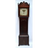 An 19th century oak and mahogany longcase clock,