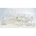 A quantity of clear cut and pressed glass to include a decanter, a miniature cruet set,