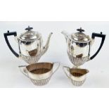 WALKER & HALL; an electroplated four piece coffee set comprising a footed gadrooned coffee pot,