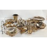 A quantity of electroplated item to include various baskets and dishes, a bottle cooler,