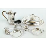 A small group of electroplated items to include an oval entrée dish, a tea strainer with bowl,