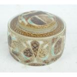 ROYAL COPENHAGEN; a faience circular pot and cover decorated with an abstract design in turquoise,