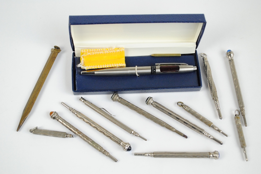 A group of twelve propelling pencils, and a boxed 'Pen Watch' (13).