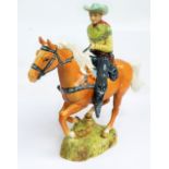 A Beswick figure 'Canadian Mounted Cowboy', model No. 1377, height 23cm.
