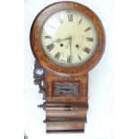 An early 20th century mahogany and inlaid eight day drop dial clock,