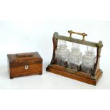 A 19th century rosewood sarcophagus tea caddy with rectangular mother of pearl escutcheon on four