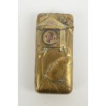 An unusual early 20th century brass vesta case embossed with Oriental figures,